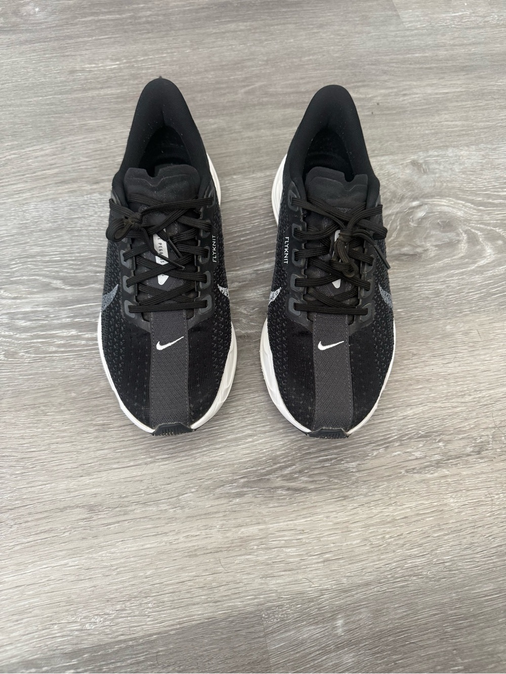 Nike Women’s Black Running Shoes with White Sole